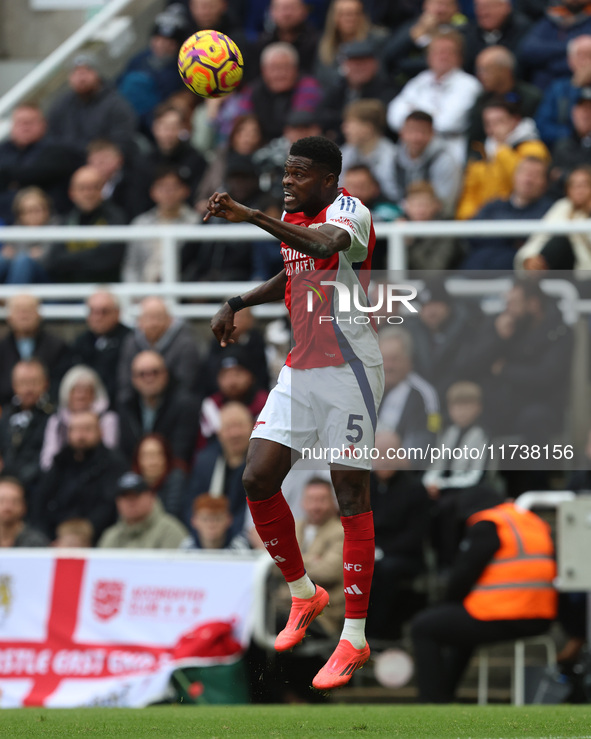 Thomas Partey plays during the Premier League match between Newcastle United and Arsenal at St. James's Park in Newcastle, United Kingdom, o...