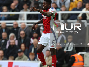 Thomas Partey plays during the Premier League match between Newcastle United and Arsenal at St. James's Park in Newcastle, United Kingdom, o...