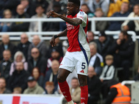 Thomas Partey plays during the Premier League match between Newcastle United and Arsenal at St. James's Park in Newcastle, United Kingdom, o...