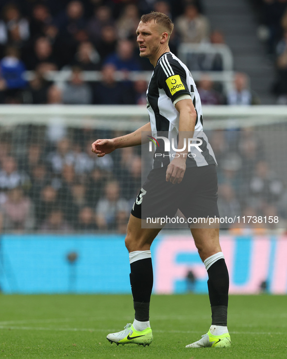 Dan Burn of Newcastle United participates in the Premier League match between Newcastle United and Arsenal at St. James's Park in Newcastle,...