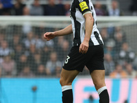 Dan Burn of Newcastle United participates in the Premier League match between Newcastle United and Arsenal at St. James's Park in Newcastle,...