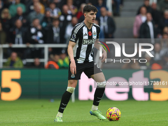 Tino Livramento of Newcastle United is in action during the Premier League match between Newcastle United and Arsenal at St. James's Park in...