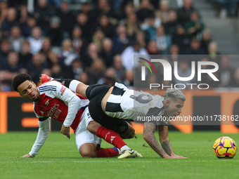 Arsenal's Ethan Nwaneri battles with Newcastle United's Bruno Guimaraes during the Premier League match between Newcastle United and Arsenal...