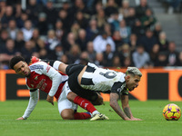 Arsenal's Ethan Nwaneri battles with Newcastle United's Bruno Guimaraes during the Premier League match between Newcastle United and Arsenal...