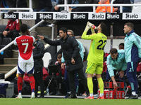 Arsenal manager Mikel Arteta gives instructions to Bukayo Saka during the Premier League match between Newcastle United and Arsenal at St. J...