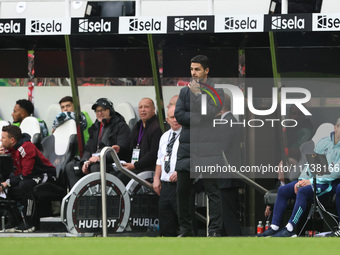 Arsenal manager Mikel Arteta looks on during the Premier League match between Newcastle United and Arsenal at St. James's Park in Newcastle,...