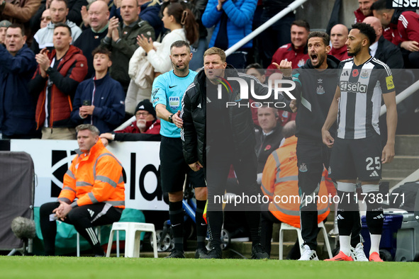 Newcastle United manager Eddie Howe and assistant manager Jason Tindall give instructions while Lloyd Kelly waits to make his entrance to th...