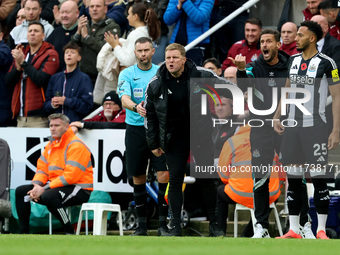 Newcastle United manager Eddie Howe and assistant manager Jason Tindall give instructions while Lloyd Kelly waits to make his entrance to th...