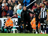 Newcastle United manager Eddie Howe and assistant manager Jason Tindall give instructions while Lloyd Kelly waits to make his entrance to th...