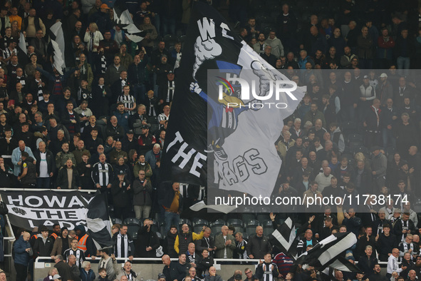 Newcastle United's fans in the Gallowgate End celebrate their 1-0 win during the Premier League match between Newcastle United and Arsenal a...