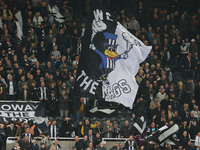 Newcastle United's fans in the Gallowgate End celebrate their 1-0 win during the Premier League match between Newcastle United and Arsenal a...