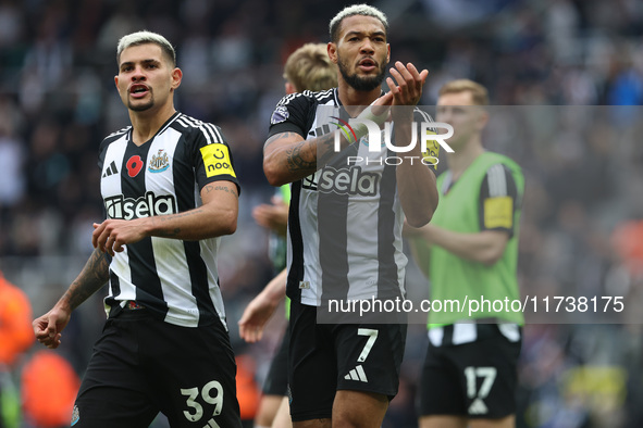 Bruno Guimaraes and Joelinton of Newcastle United applaud their fans after their 1-0 win during the Premier League match between Newcastle U...