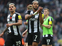 Bruno Guimaraes and Joelinton of Newcastle United applaud their fans after their 1-0 win during the Premier League match between Newcastle U...