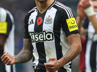 Bruno Guimaraes celebrates with Newcastle United fans after their 1-0 win during the Premier League match between Newcastle United and Arsen...