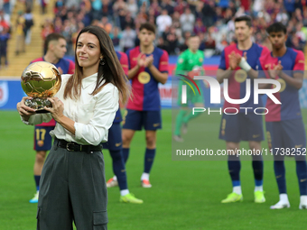 Aitana Bonmati offers her second Ballon d'Or to the supporters before the match between FC Barcelona and RCD Espanyol, corresponding to week...