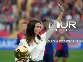 Aitana Bonmati offers her second Ballon d'Or to the supporters before the match between FC Barcelona and RCD Espanyol, corresponding to week...