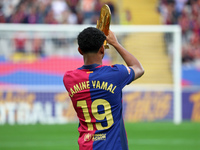 Lamine Yamal presents the Kopa Trophy to the supporters before the match between FC Barcelona and RCD Espanyol, corresponding to week 12 of...