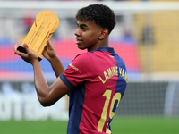 Lamine Yamal presents the Kopa Trophy to the supporters before the match between FC Barcelona and RCD Espanyol, corresponding to week 12 of...