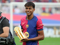 Lamine Yamal presents the Kopa Trophy to the supporters before the match between FC Barcelona and RCD Espanyol, corresponding to week 12 of...