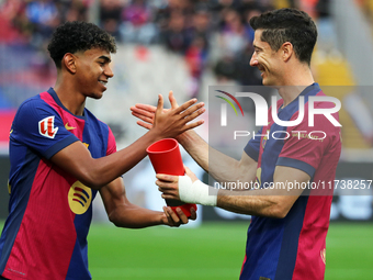 Lamine Yamal gives Robert Lewandowski the MVP of the month of October EA Sports LaLiga award before the match between FC Barcelona and RCD E...