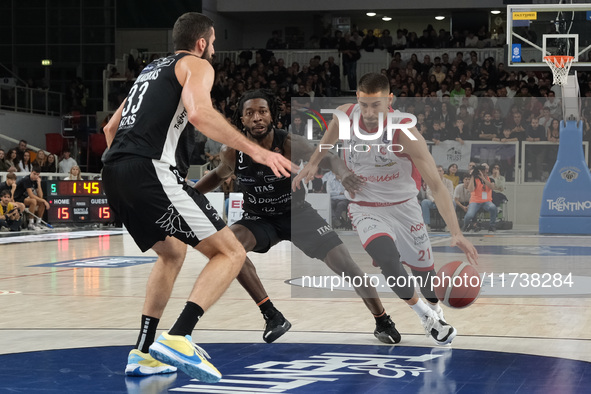 Diego Flaccadori of EA7 Emporio Armani Milano contrasts with Myles Cale of Dolomiti Energia Trentino during the match between Dolomiti Energ...