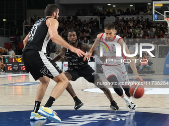 Diego Flaccadori of EA7 Emporio Armani Milano contrasts with Myles Cale of Dolomiti Energia Trentino during the match between Dolomiti Energ...