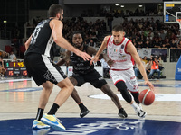 Diego Flaccadori of EA7 Emporio Armani Milano contrasts with Myles Cale of Dolomiti Energia Trentino during the match between Dolomiti Energ...