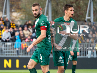 Damian Kostkowski and Oskar Sewerzynski participate in the game between Wieczysta Krakow and Olimpia Grudziadz in Krakow, Poland, on Novembe...