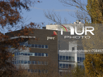 The logo of the accounting firm PricewaterhouseCoopers (PwC) is on the top of a building in Warsaw, Poland, on November 3, 2024. (