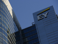 The EY (Ernst & Young) logo is pictured in Warsaw, Poland, on November 3, 2024. (