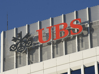 A logo of Swiss bank UBS (Union Bank of Switzerland) is pictured in Warsaw, Poland, on November 3, 2024. (