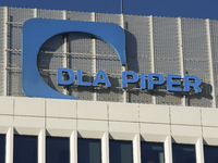 The signage of the multinational law firm DLA Piper is pictured in Warsaw, Poland, on November 3, 2024. (