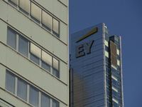 The EY (Ernst & Young) logo is pictured in Warsaw, Poland, on November 3, 2024. (