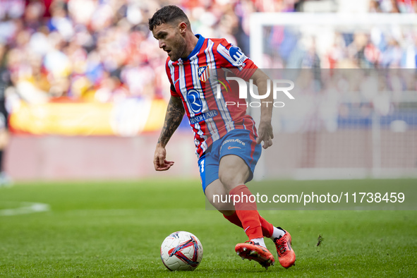 Javi Galan of Atletico de Madrid is in action with the ball during the La Liga EA Sports 2024/25 football match between Atletico de Madrid a...