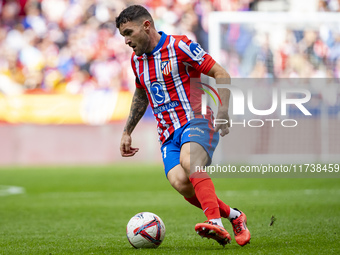 Javi Galan of Atletico de Madrid is in action with the ball during the La Liga EA Sports 2024/25 football match between Atletico de Madrid a...