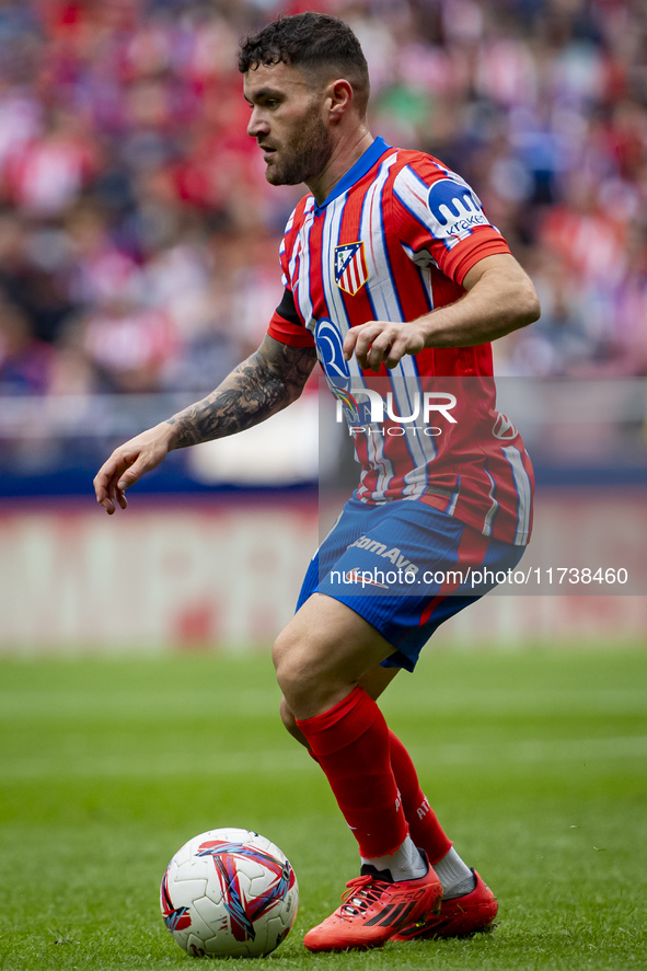 Javi Galan of Atletico de Madrid is in action with the ball during the La Liga EA Sports 2024/25 football match between Atletico de Madrid a...