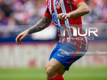 Javi Galan of Atletico de Madrid is in action with the ball during the La Liga EA Sports 2024/25 football match between Atletico de Madrid a...