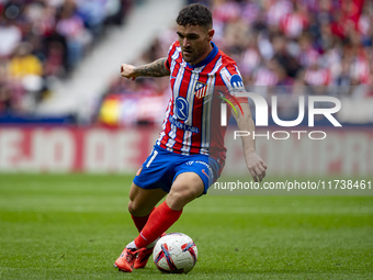 Javi Galan of Atletico de Madrid is in action with the ball during the La Liga EA Sports 2024/25 football match between Atletico de Madrid a...