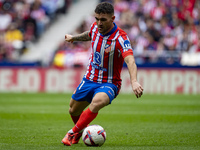 Javi Galan of Atletico de Madrid is in action with the ball during the La Liga EA Sports 2024/25 football match between Atletico de Madrid a...