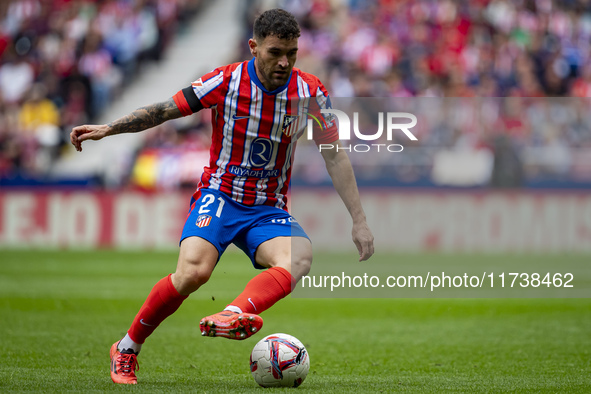 Javi Galan of Atletico de Madrid is in action with the ball during the La Liga EA Sports 2024/25 football match between Atletico de Madrid a...