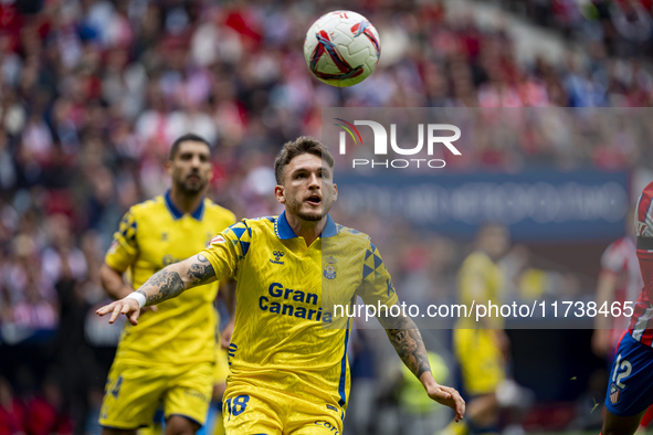 Victor Alvarez Rozada (Viti) of UD Las Palmas plays with the ball during the La Liga EA Sports 2024/25 football match between Atletico de Ma...