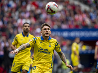 Victor Alvarez Rozada (Viti) of UD Las Palmas plays with the ball during the La Liga EA Sports 2024/25 football match between Atletico de Ma...