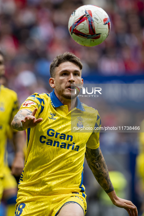 Victor Alvarez Rozada (Viti) of UD Las Palmas plays with the ball during the La Liga EA Sports 2024/25 football match between Atletico de Ma...