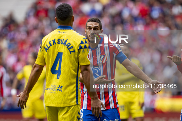 Jorge Resurreccion Merodio (Koke) of Atletico de Madrid (R) argues with Alex Suarez of UD Las Palmas (L) during the La Liga EA Sports 2024/2...