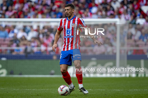 Clement Lenglet of Atletico de Madrid is in action with the ball during the La Liga EA Sports 2024/25 football match between Atletico de Mad...