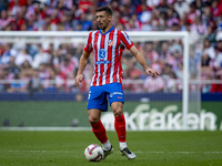 Clement Lenglet of Atletico de Madrid is in action with the ball during the La Liga EA Sports 2024/25 football match between Atletico de Mad...