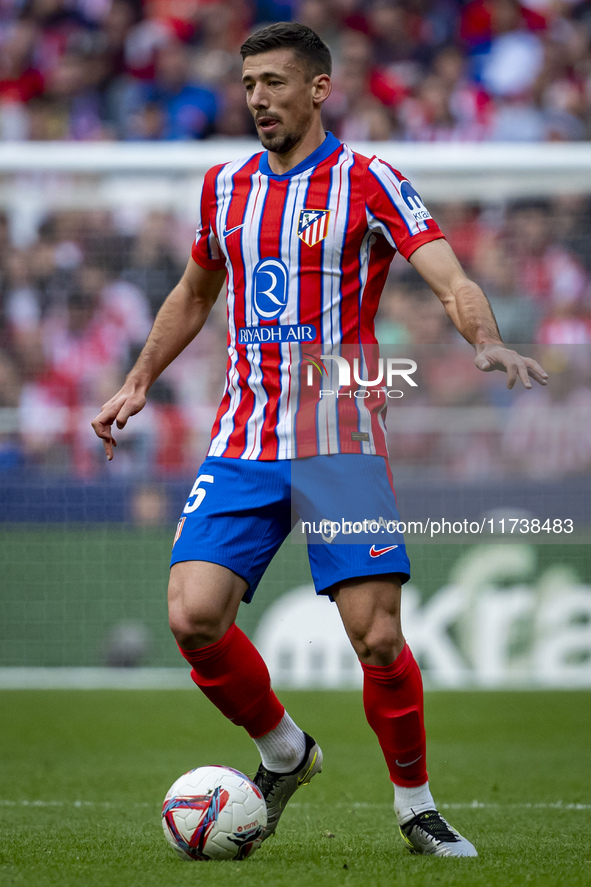 Clement Lenglet of Atletico de Madrid is in action with the ball during the La Liga EA Sports 2024/25 football match between Atletico de Mad...