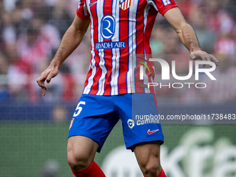 Clement Lenglet of Atletico de Madrid is in action with the ball during the La Liga EA Sports 2024/25 football match between Atletico de Mad...