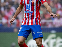 Clement Lenglet of Atletico de Madrid is in action with the ball during the La Liga EA Sports 2024/25 football match between Atletico de Mad...