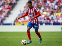 Samuel Lino of Atletico de Madrid is in action with the ball during the La Liga EA Sports 2024/25 football match between Atletico de Madrid...